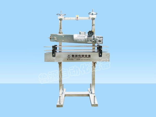 SF-1型直線式塑防蓋壓蓋機(jī)